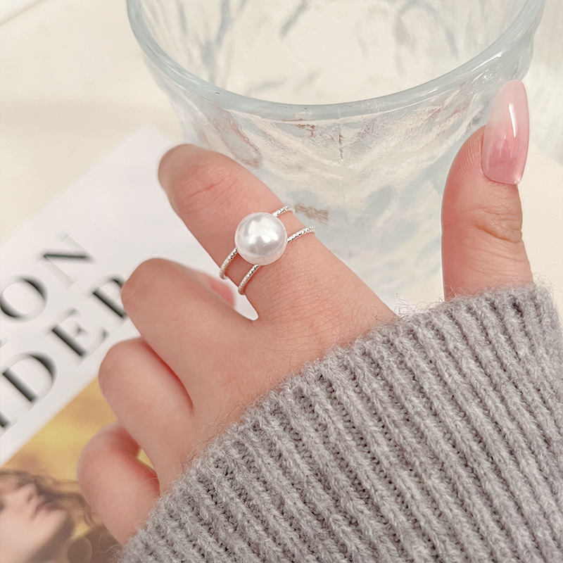 A new minimalist pearl imitation ring with a fashionable design for women, featuring an open double-layer design and a fresh and elegant European and American style. It is a joint ring Specification drawing