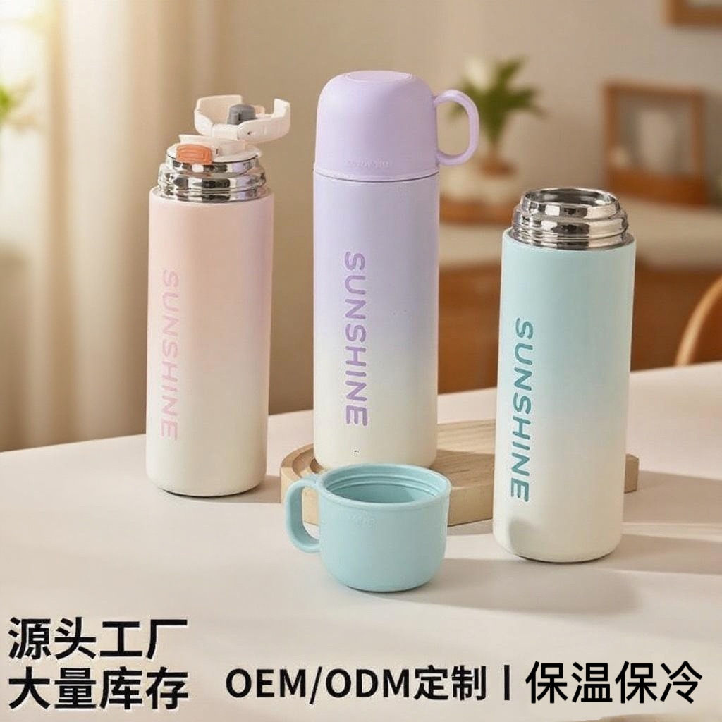 The popular gradient color 316 stainless steel double-drinking insulated cup has a high appearance level, is a portable hand-held bouncy cup, and has a large capacity water cup full figure