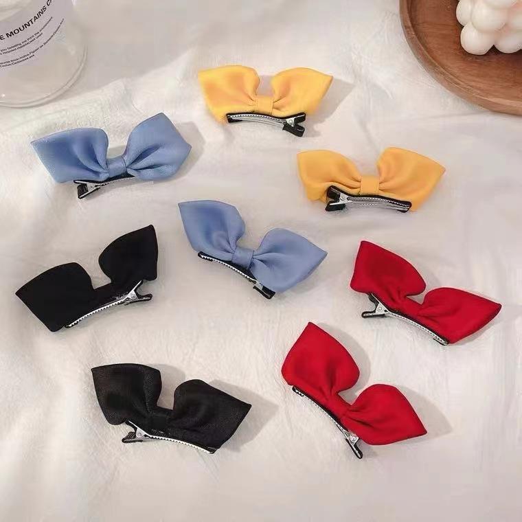 Korean-style children's hair clips, bow three-dimensional headwear, solid color fabric hair clips for girls that won't damage hair, side bangs clips details Picture