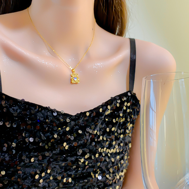 Wholesale of Japanese and Korean fresh and colorful heart-shaped bear pendant titanium steel necklace, women's niche light luxury high-end collarbone chain details Picture