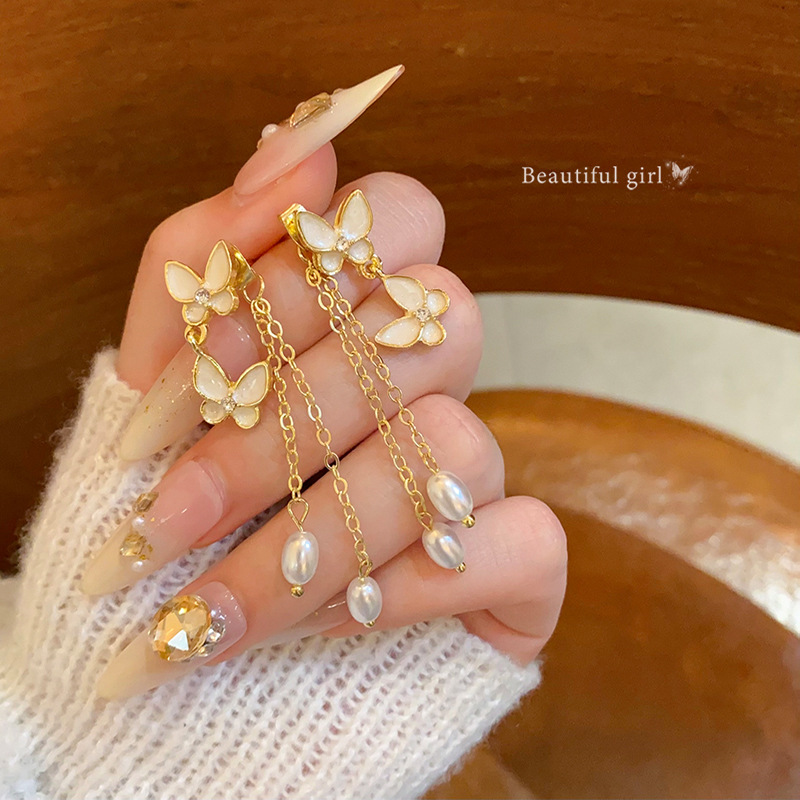 Shell, butterfly, pearl, tassel earrings, women's high-end, light luxury, fashionable and elegant stud earrings, one pair of two-wear earrings wholesale full figure