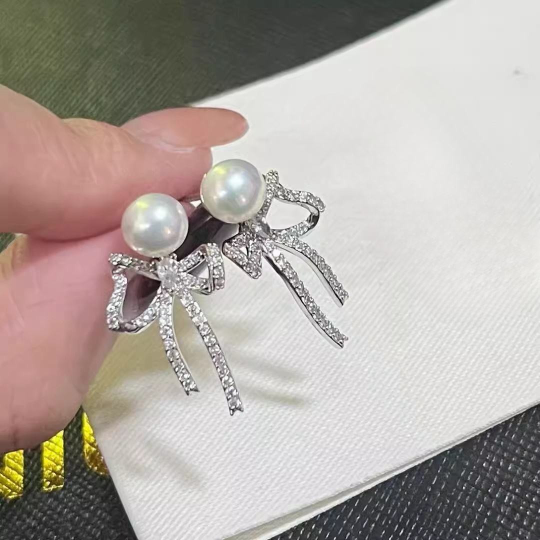 Xuhui brand exquisite and light luxury copper plated with real gold, zircon 925 silver needle, bow, pearl, fashionable and elegant stud earrings, earrings and pendants details Picture