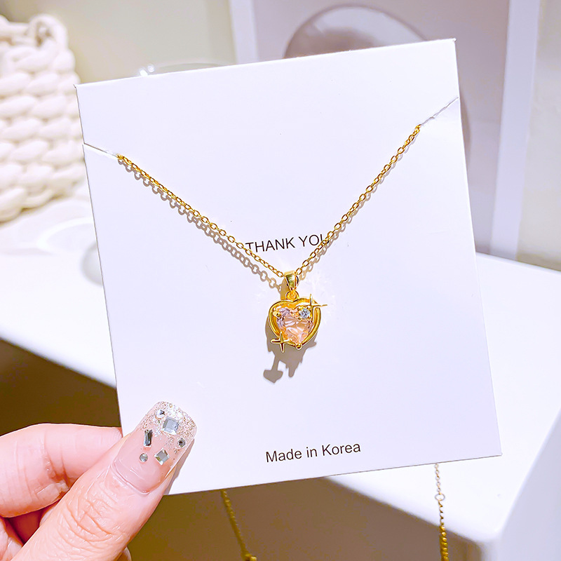 Wholesale of Korean version fashionable new pink heart-shaped zircon pendant titanium steel necklace, women's niche design sense starlight jewelry details Picture
