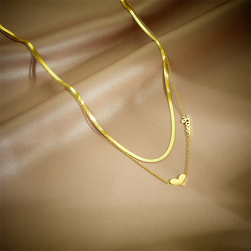 Korean-style fashionable and niche design double-layer overlapping snake bone chain heart-shaped letter pendant chain titanium steel jewelry necklace full figure