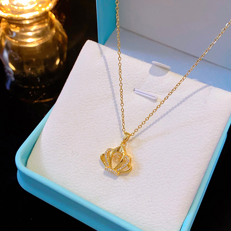 European and American style fashionable crown dynamic titanium steel necklace, women's micro-inlaid zircon pendant, internet-famous high-end jewelry wholesale Application Scenario