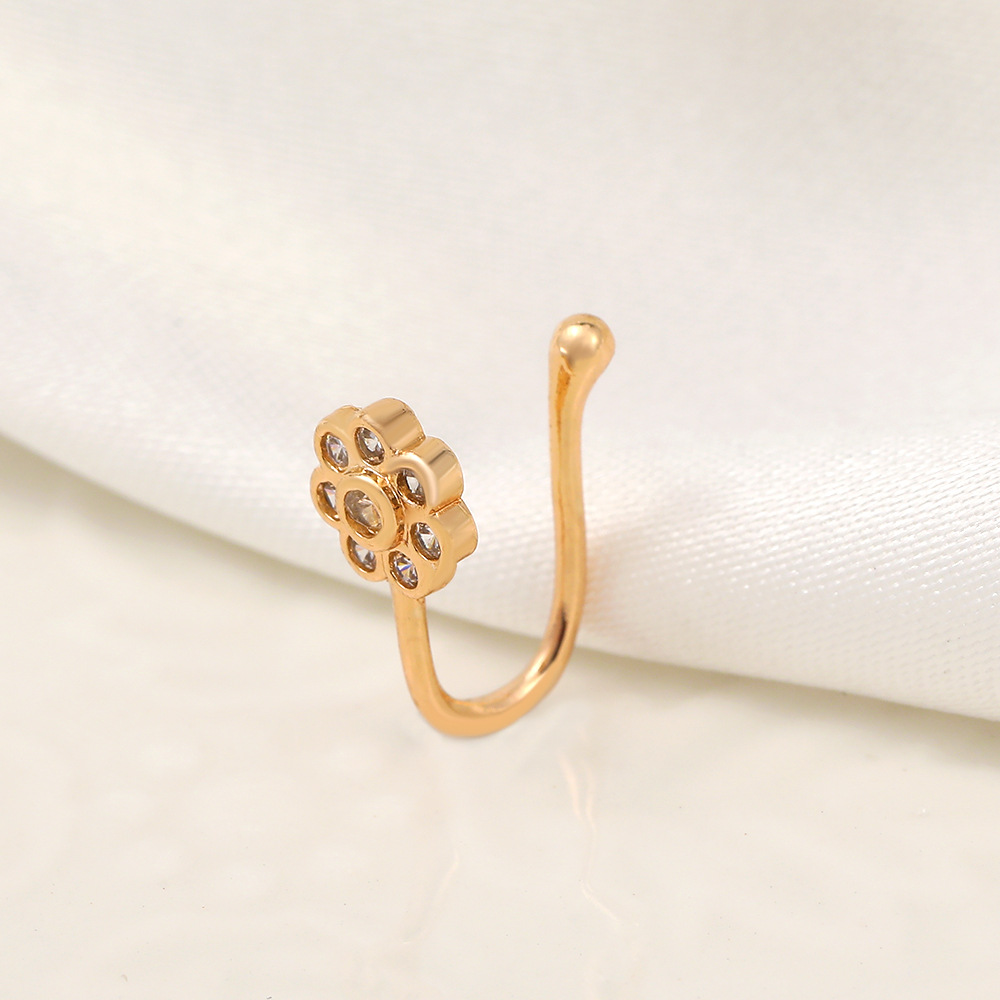 A popular flower-shaped zircon nose ring in Europe and America, a metal U-shaped micro-inlaid non-perforated nose stud, and a simple puncture accessory for export Specification drawing