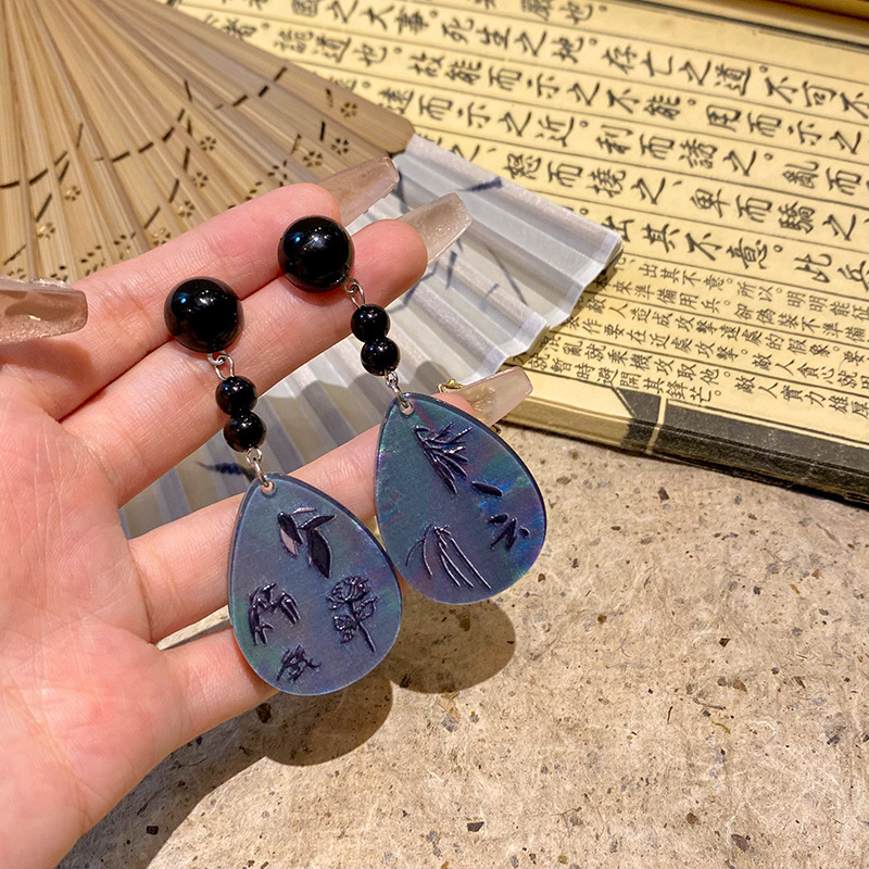 New Chinese-style ancient-style fan-shaped earrings for women, light luxury, niche and high-end feel, retro tassel bamboo leaf ear studs, popular earrings full figure