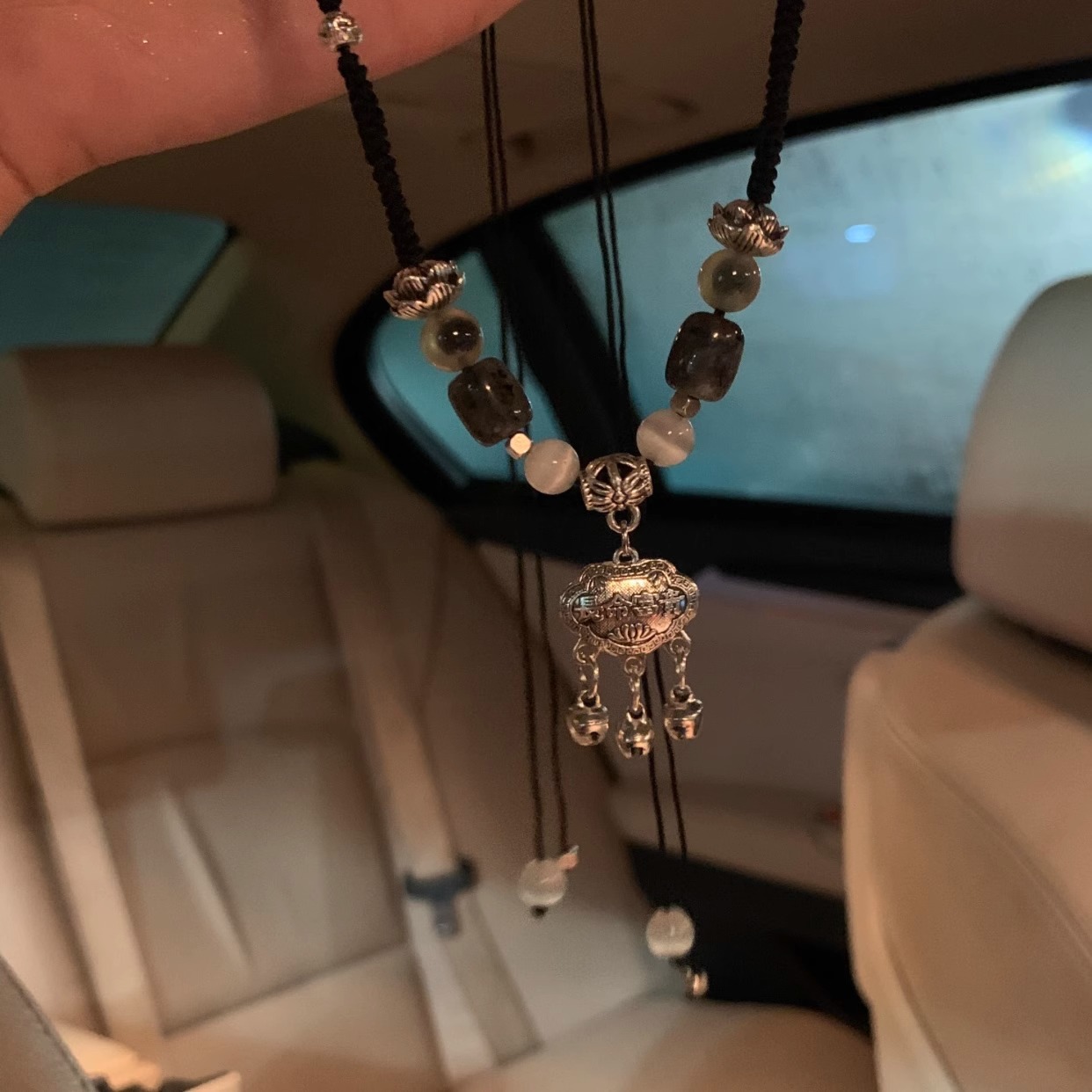 Hand-woven peace lock necklace for women, with a unique design sense that makes a sound with each step, a light luxury Chinese-style drawstring hoodie chain for women Application Scenario