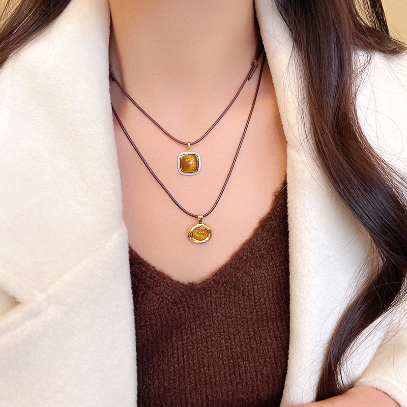 Autumn and winter tiger's eye stone leather rope pull-out necklace for women, Maillard long sweater chain, personalized collarbone chain autumn and winter accessories details Picture