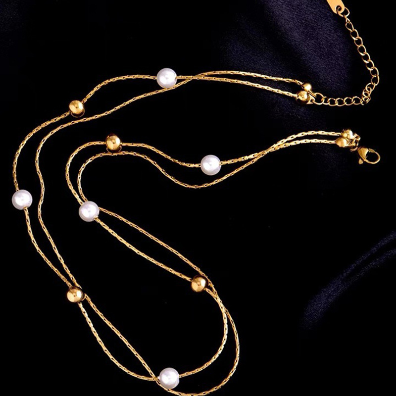European and American fashion, niche and unique double-layer chain imitation pearl round bead titanium steel stacked accessory collarbone necklace Application Scenario