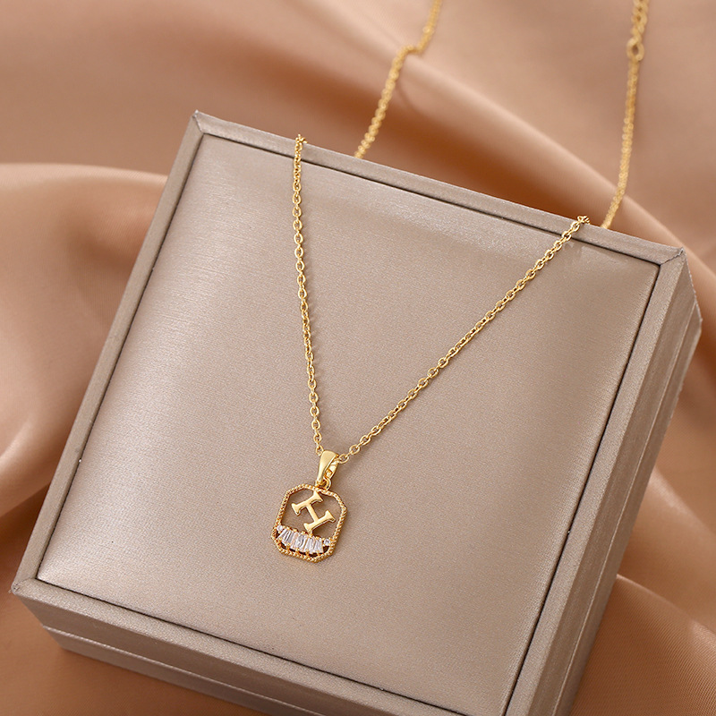 This Japanese and Korean style geometric micro-inlay H-shaped pendant titanium steel necklace features a niche design for women and is versatile. It is a delicate collarbone chain accessory full figure