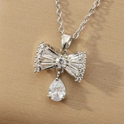 New women's necklace with micro-inlaid zircon bow water drop necklace, Japanese and Korean style niche design collarbone chain accessory wholesale details Picture
