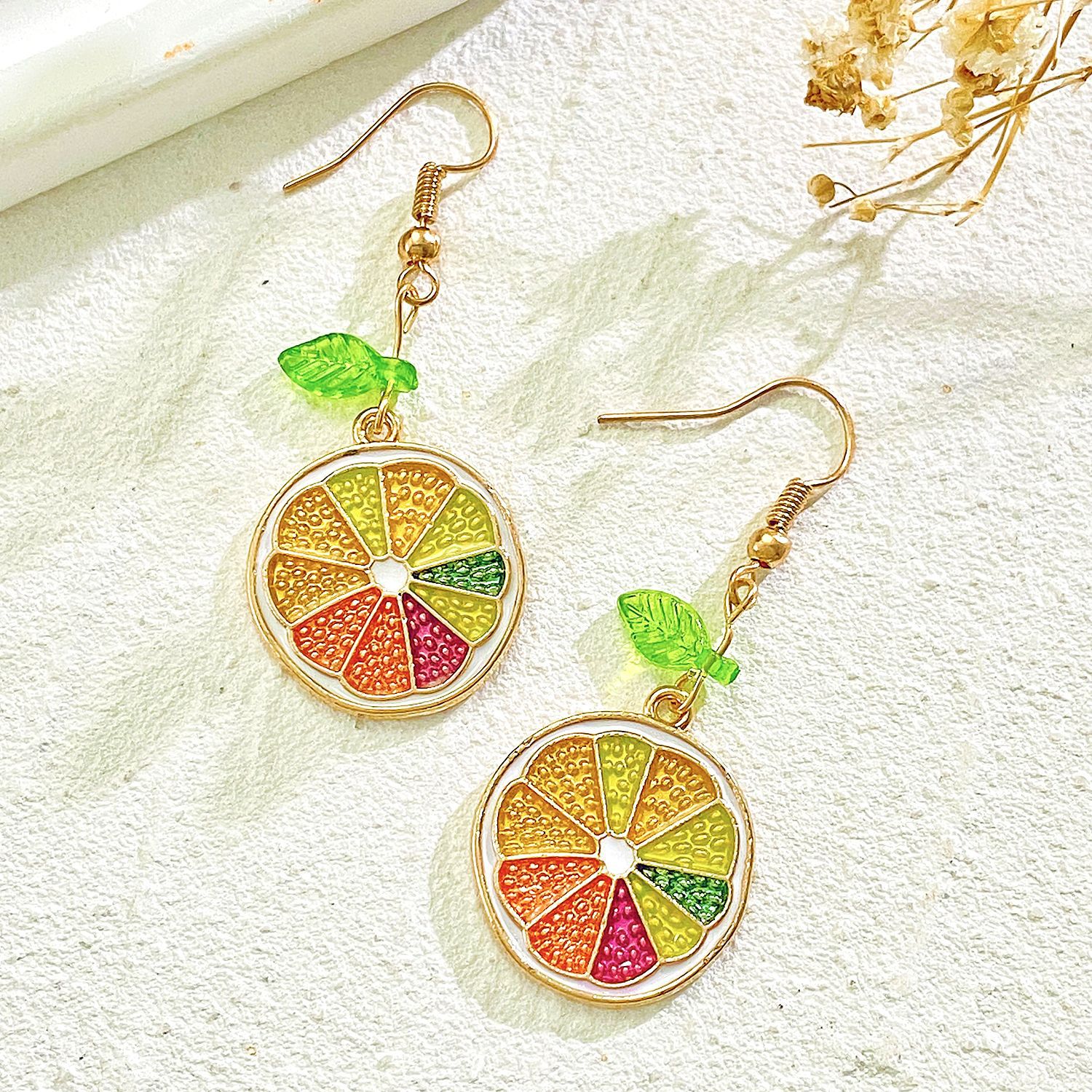 Forest-style fresh seven-color lemon earrings, women's creative simulation pomelo fruit stud earrings and pendants, ins style European and American earrings Application Scenario
