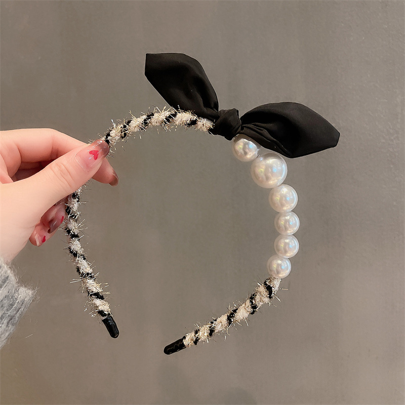 A new spring French and Korean short hair band with little rabbit ears for women, featuring pearl and simple headwear for young girls full figure