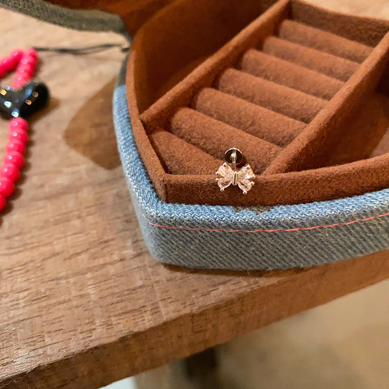 Delicate and small bow zircon stud earrings for women, high-end ear bone stud flat-bottomed screw earrings, niche and sweet earrings Application Scenario