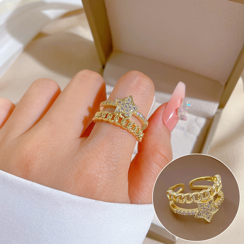 【 Real gold electroplating 】 Open five-pointed star female fashion slightly inlaid light luxury ring index finger ring, the same style as Internet celebrities, cold style full figure