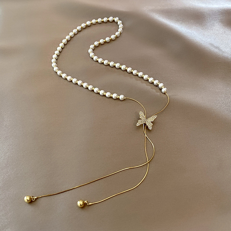 A new Korean ins titanium steel pearl necklace for women, a light luxury and niche style that is the same as the popular online celebrity's full-diamond butterfly tassel collarbone chain Specification drawing