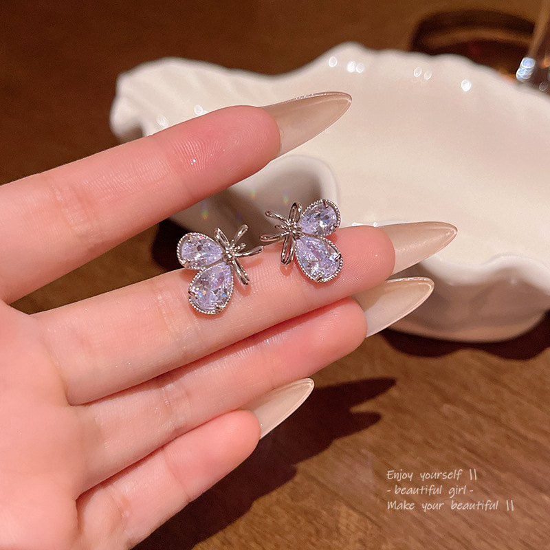 Light luxury super flash zircon heart-shaped stud earrings, women's unique bow, high-end and elegant earrings, fashionable earrings wholesale full figure
