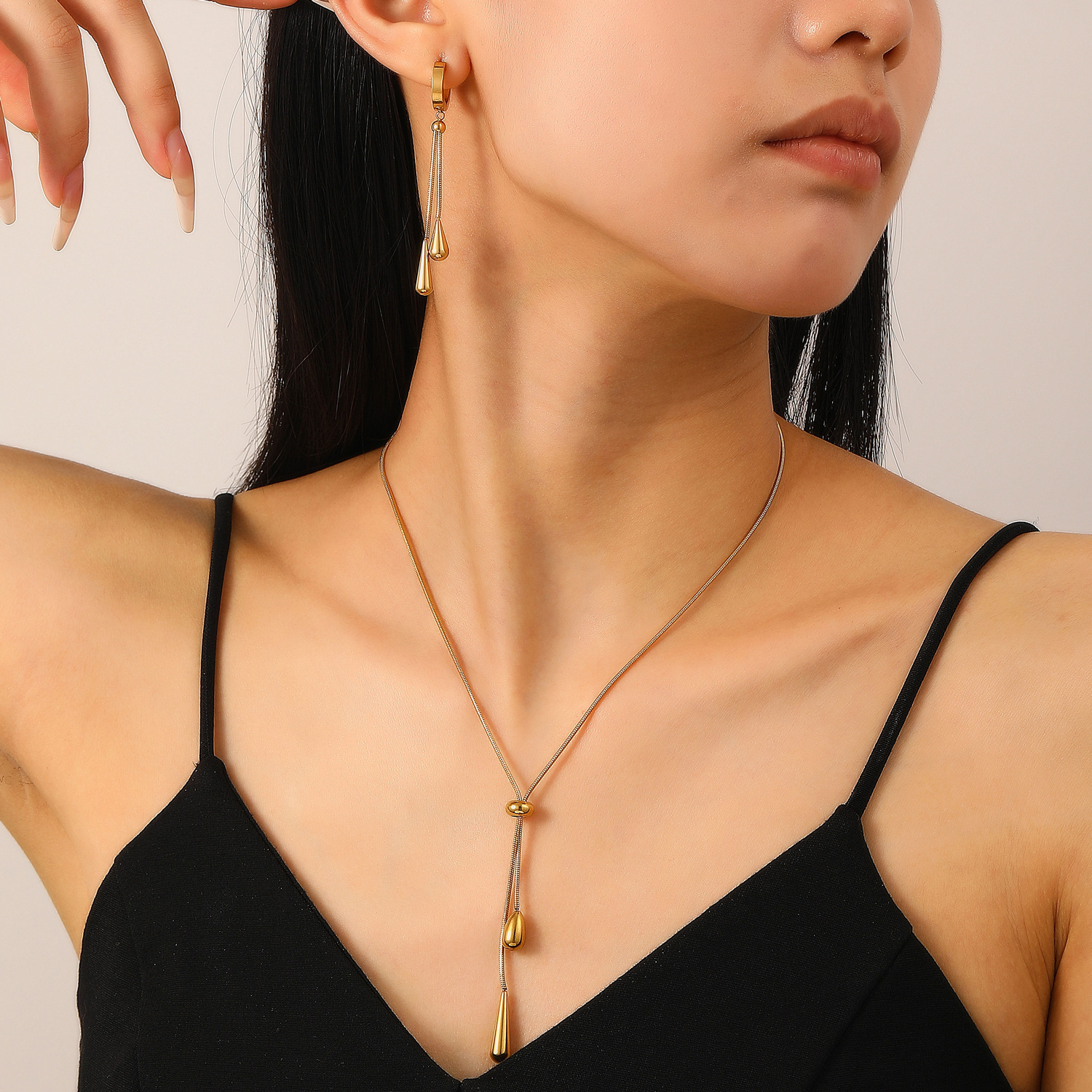 Cross-border grand, fashionable and simple style titanium steel water drop pendant necklace earrings two-piece set long pull-out high-end accessories details Picture