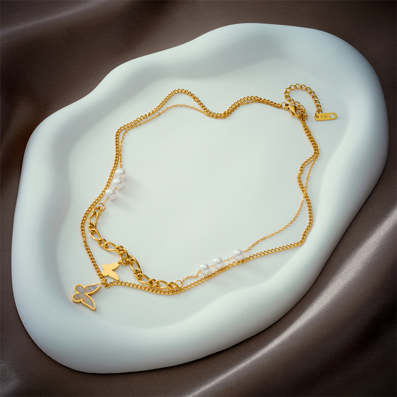 A new, fashionable, retro and niche design from Europe and America. Double-layer irregular chain beaded butterfly pendant titanium steel necklace Specification drawing