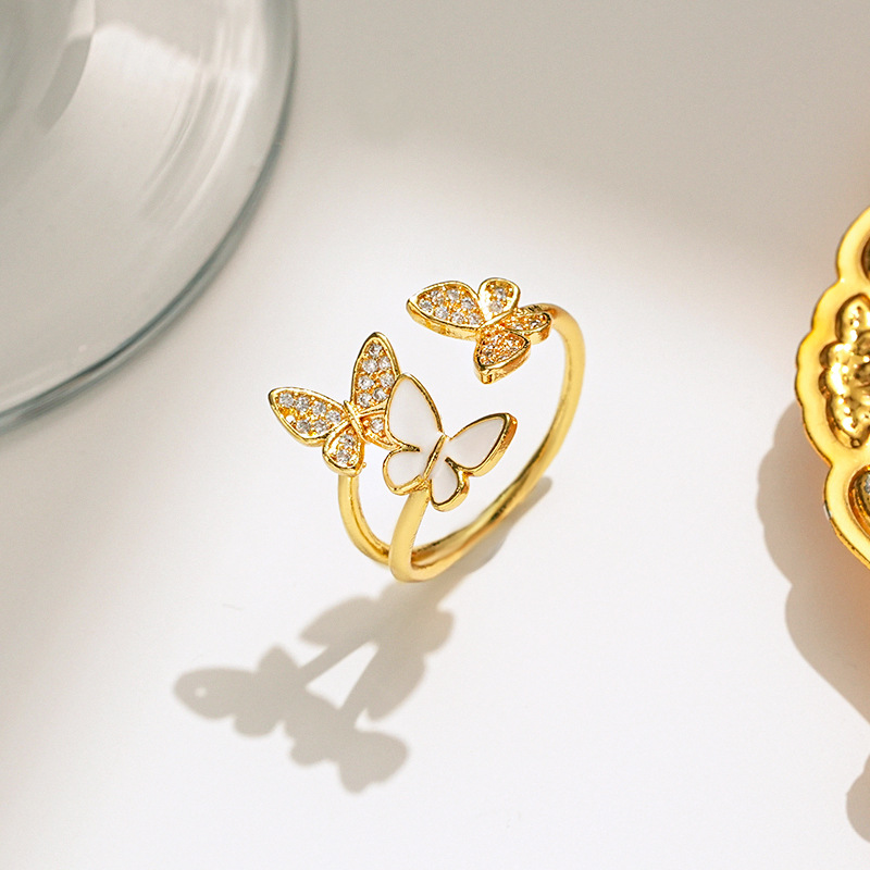 Fashionable little butterfly three-piece titanium steel necklace for women, light luxury and versatile, with zircon stud earrings and a high-end accessory Application Scenario