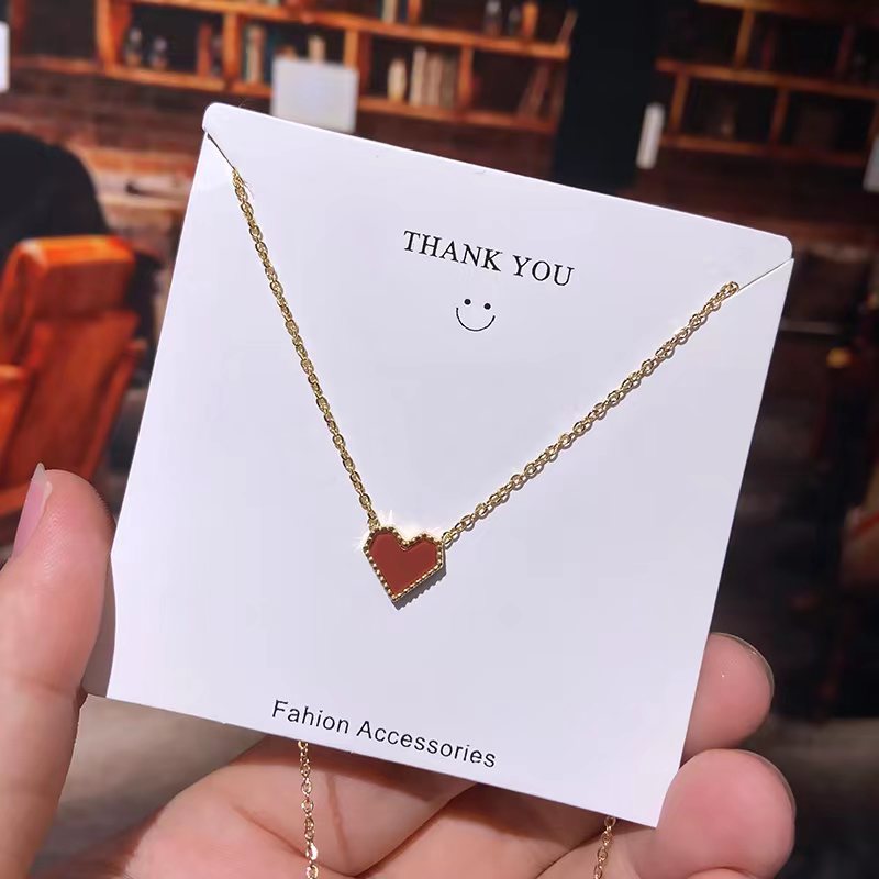 A light luxury style simple geometric small red heart titanium steel necklace with a unique female charm, an ins trendy heart-shaped collarbone chain accessory details Picture