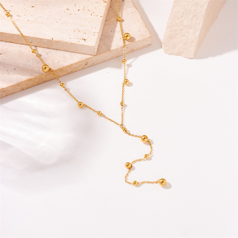Fashionable and simple, versatile for commuting, long tassel round ball, gold bead pendant, chain, titanium steel jewelry necklace Specification drawing