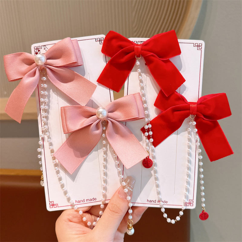 Children's New Year Red and festive pearl chain bow hair clip, baby princess headwear hair clip, girl tassel pair clip Application Scenario