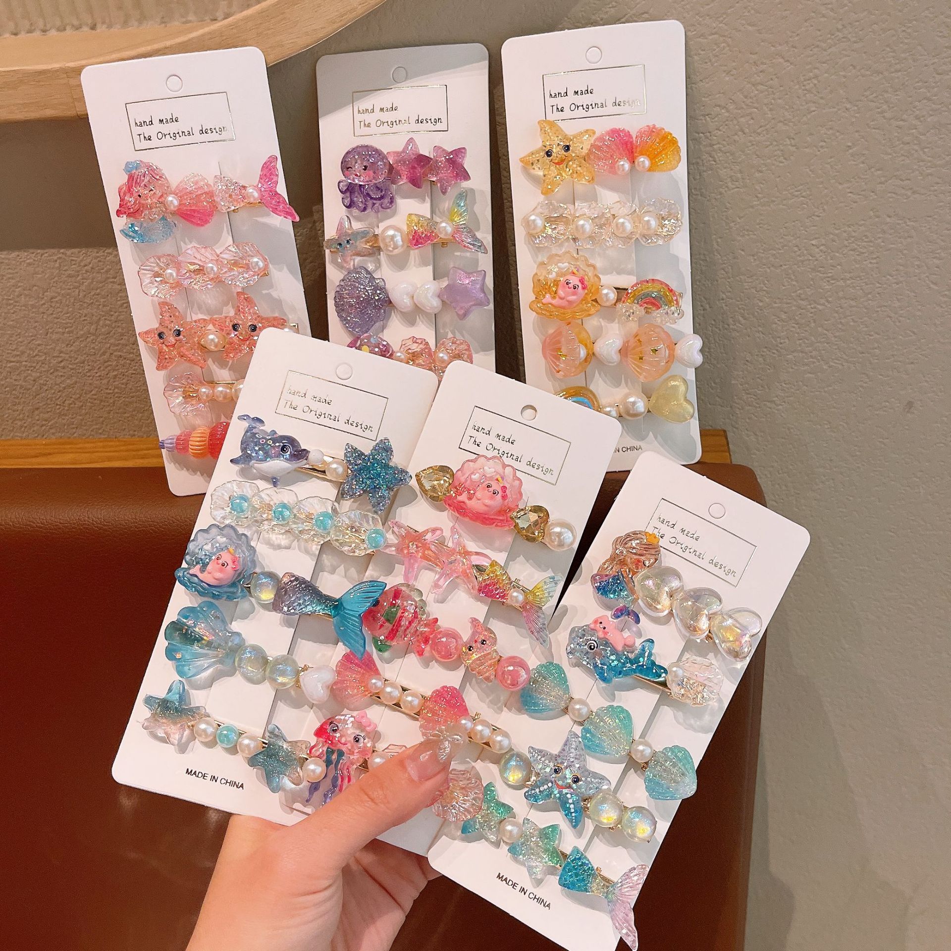 The new children's cute ocean series hair clips, cartoon mermaid, shell and starfish hair accessories will not damage the sides of the baby's hair details Picture