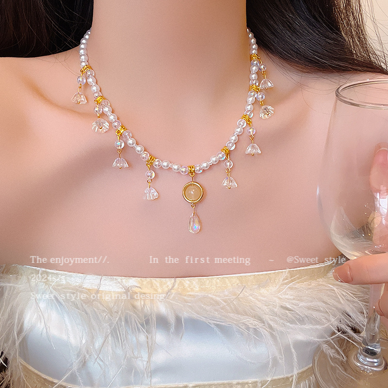Water drop pearl beaded tassel necklace for women, light luxury, niche and high-end, with a collarbone chain feel and elegant style, autumn and winter sweater chain accessory full figure