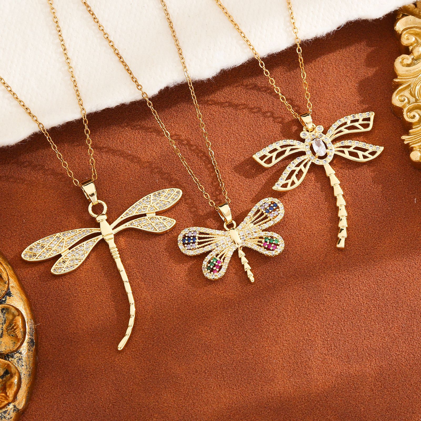 Amazon's best-selling European and American dragonfly necklace, copper zircon colored insect pendant, and exaggerated hip-hop style collarbone chain details Picture