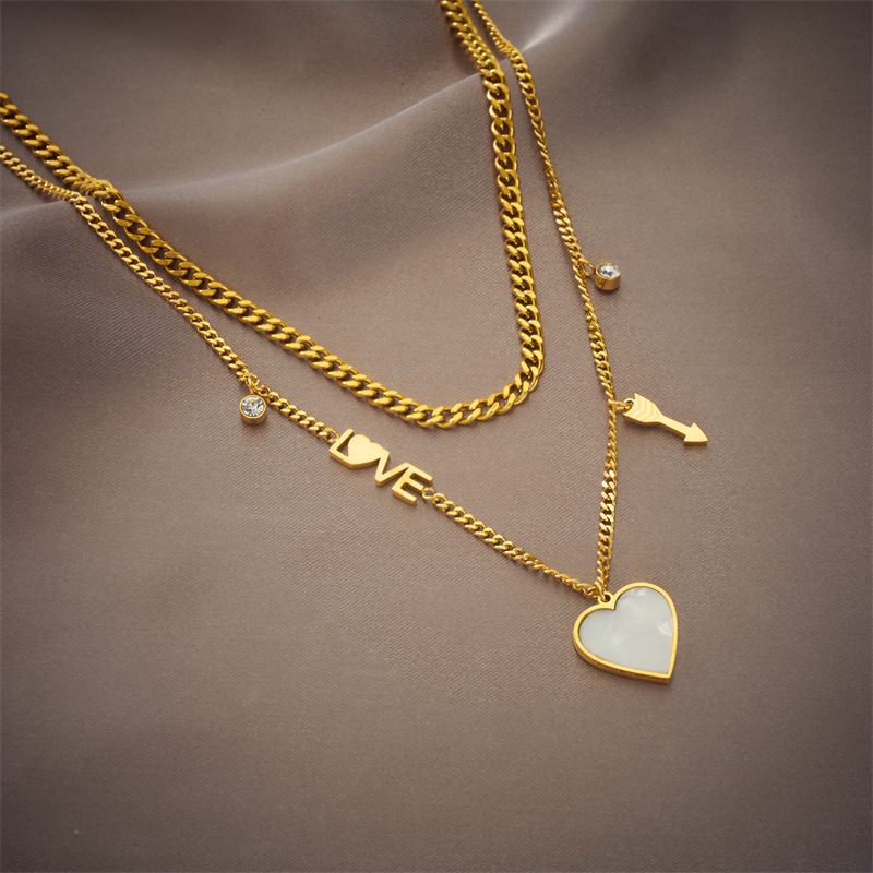 This is a trendy and versatile Japanese and Korean fashion, heart-shaped Instagram, minimalist double-layer titanium steel collarbone necklace that won't fade details Picture