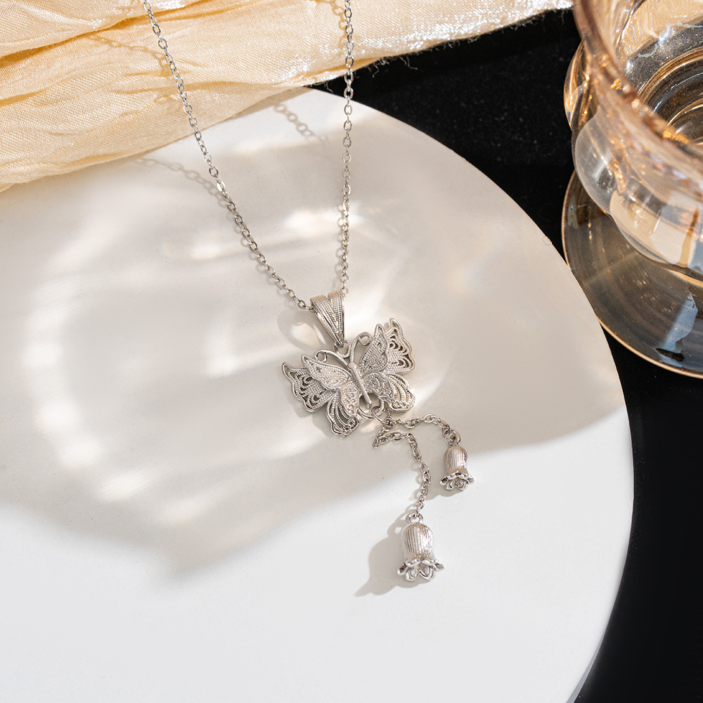 Exquisite and girlish butterfly love flower necklace, creative design for women, lily of the valley tassel butterfly pendant, titanium steel collarbone chain details Picture