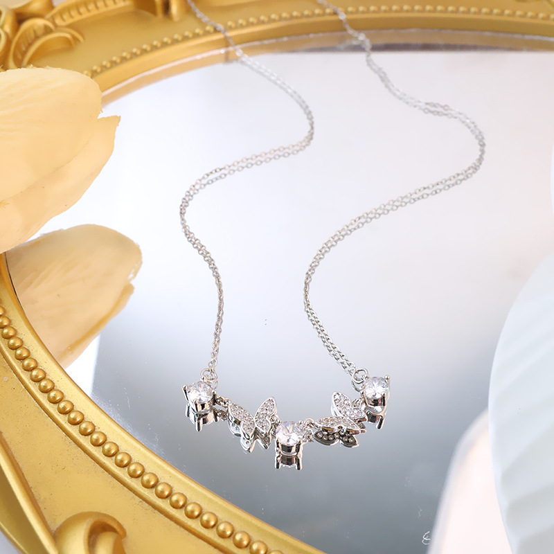 Wholesale of Korean-style fashion zircon necklace with three round diamonds and two butterfly necklaces in gold, luxurious and light luxury collarbone chain Application Scenario