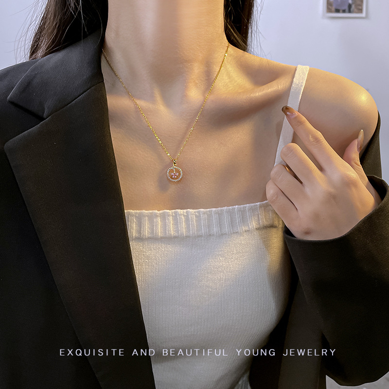 A high-end Japanese and Korean diamond-encruted round geometric titanium steel necklace with a unique and light luxury design for women, featuring an E-letter pendant accessory Specification drawing
