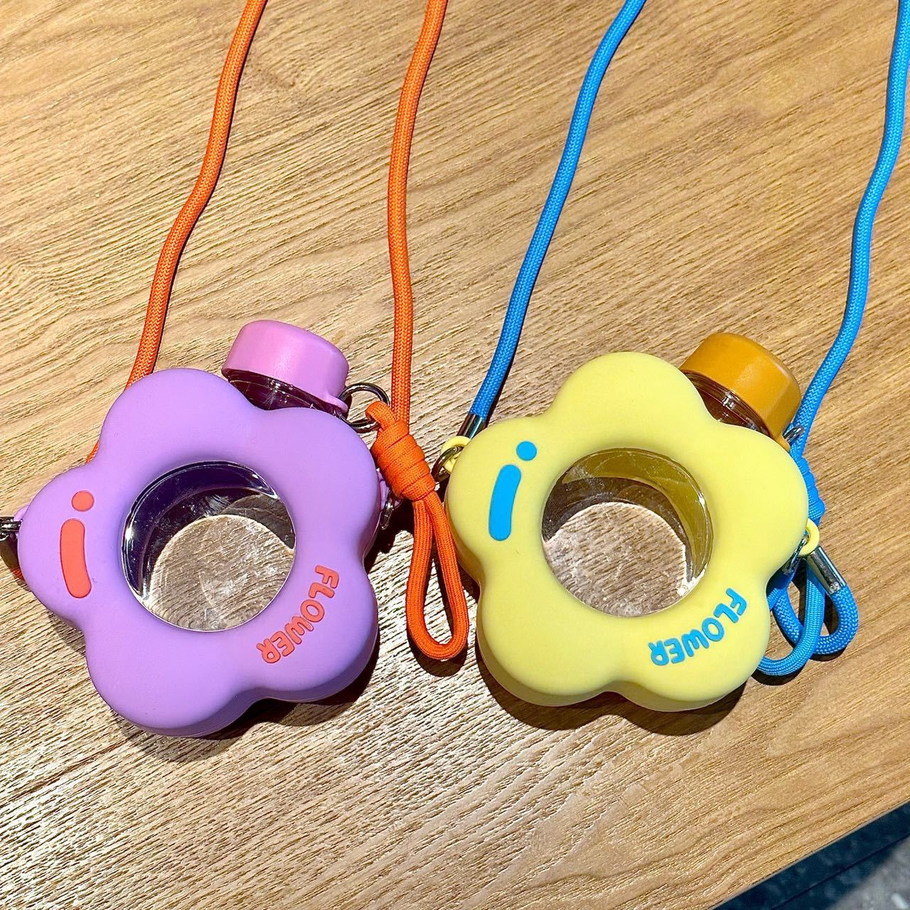 The new high-appearance-level flower cute ins slanted water cup is portable for school and work. The plastic cup is durable and can be dropped Specification drawing
