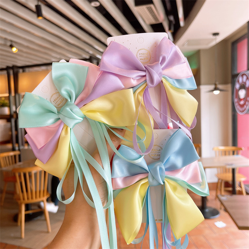 New popular princess bow hair clip, children's princess ribbon decorative duckbill clip, sweet summer hair accessory and headwear Application Scenario
