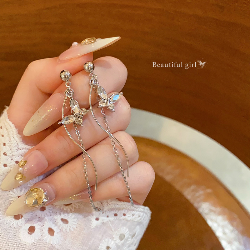 Super Flash Zircon butterfly tassel earrings, Korean style, fashionable and niche design sense, stud earrings, elegant and high-end earrings wholesale full figure