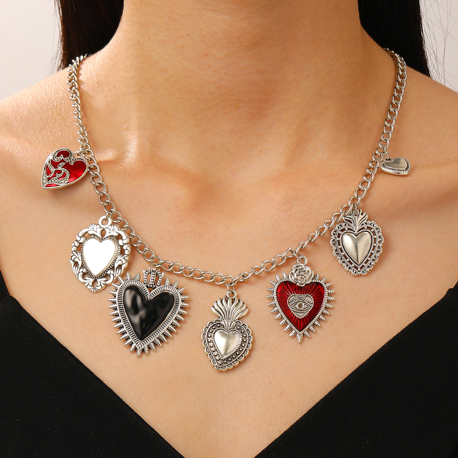 European and American cross-border exaggerated personality retro religious multiple sacred heart pendant necklace earrings for women, silver design sense heart details Picture
