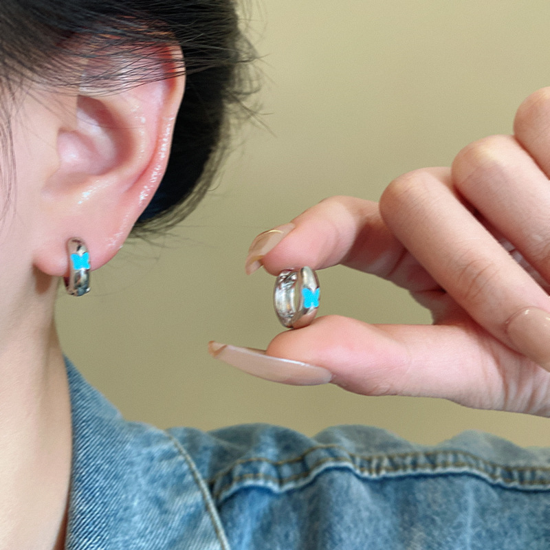 Light blue glazed butterfly earrings, women's ins-style, niche design sense ear rings, high-end and elegant ear buckles and earrings details Picture