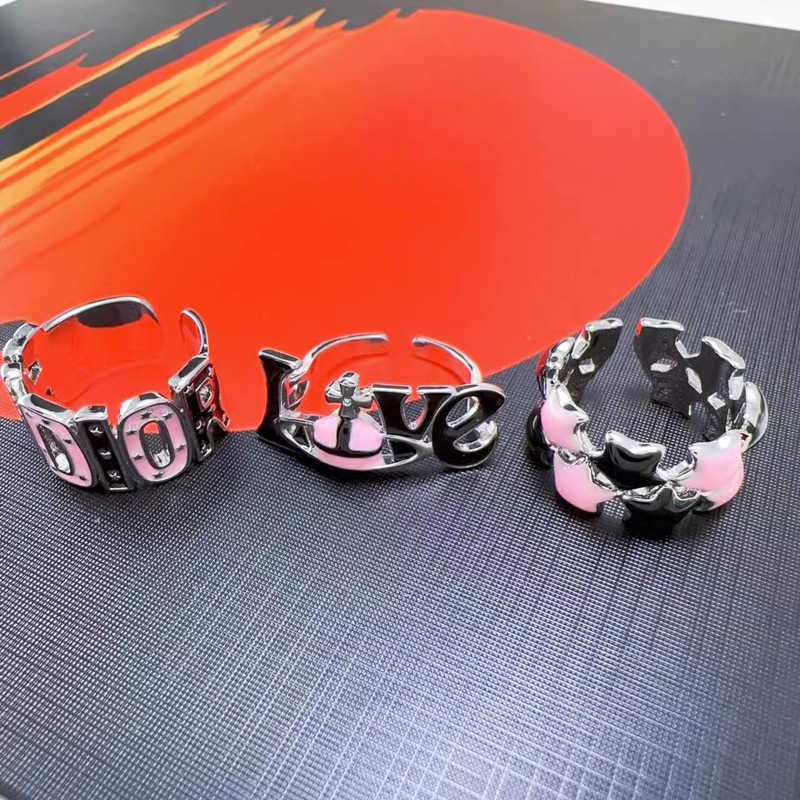 Super sweet star pink and black dual-color oil drop adjustable index finger ring, a niche design for women, sweet and cool, versatile ring for hot girls details Picture