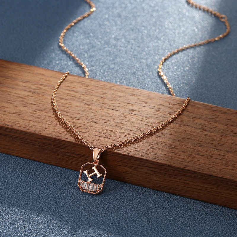 This Japanese and Korean style geometric micro-inlay H-shaped pendant titanium steel necklace features a niche design for women and is versatile. It is a delicate collarbone chain accessory Application Scenario