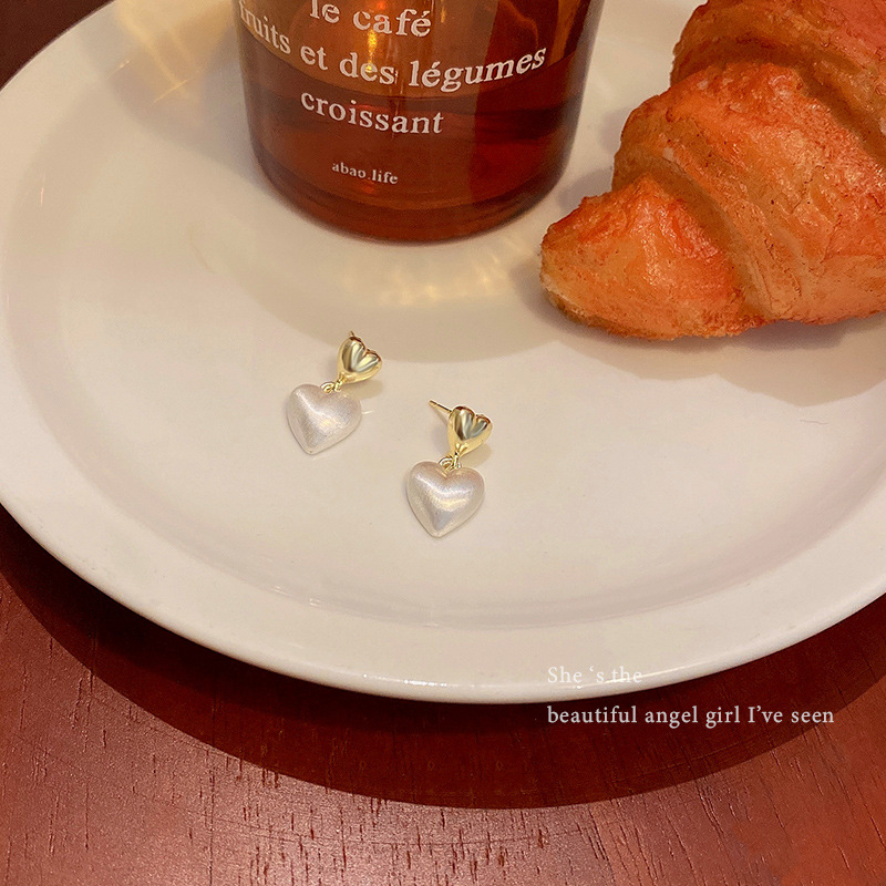 Korean-style simple matte double-layer heart-shaped earrings for women, with a light luxury and niche design sense, are versatile and personalized, and are a popular online celebrity accessory Application Scenario