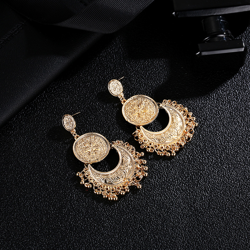 European and American retro hollowed-out crescent tassel earrings, Bohemian sun and moon shaped carved round bead tassel women's earrings details Picture