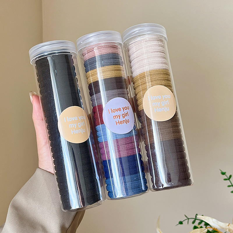 The hair band is practical and durable. It is a children's hair tie in a box that won't damage hair. It is a basic color elastic ponytail hair tie Specification drawing