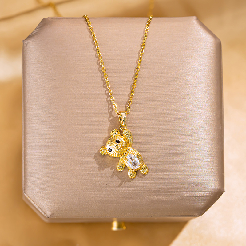 Douyin's diamond-encrusted bear titanium steel necklace, a niche design for women with a light luxury collarbone chain, is a versatile and high-end accessory full figure