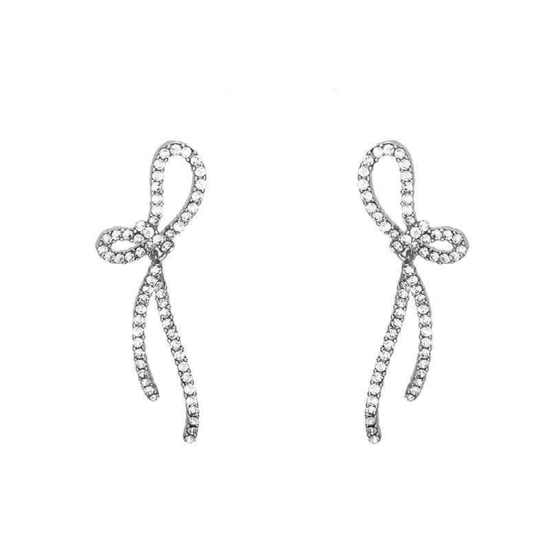 925 Silver Needle tassel Bow Earrings, a best-selling unique earring for women, exuding a light luxury and high-end charm. Stud earrings for women Item Picture