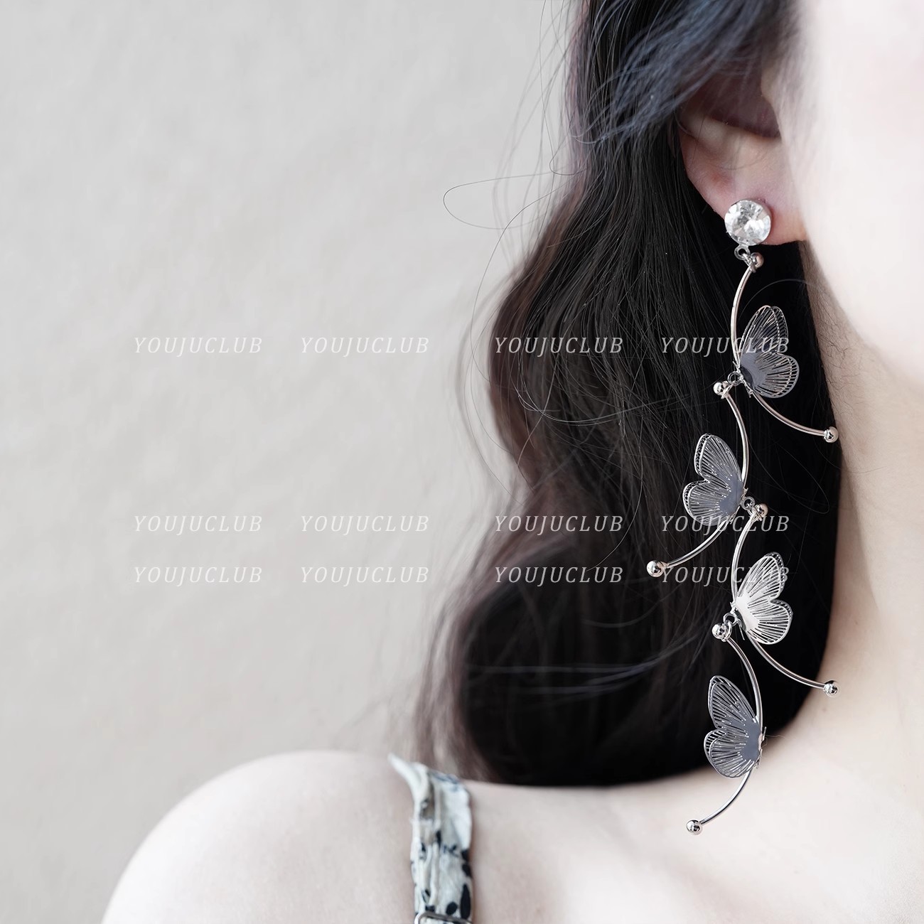 Long, ethereal, hollowed-out butterfly earrings with a light luxury, niche and high-end feel, tassel stud earrings, a versatile Korean-style ear accessory details Picture