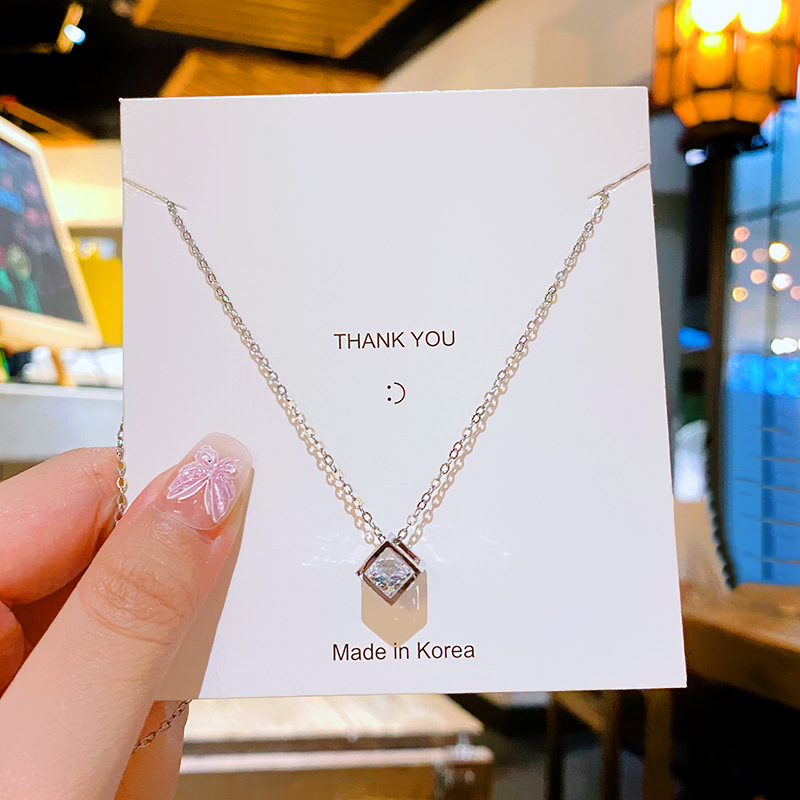 Three-dimensional square exquisite zircon pendant titanium steel necklace, a unique and high-end feminine charm, a fashionable collarbone chain accessory full figure