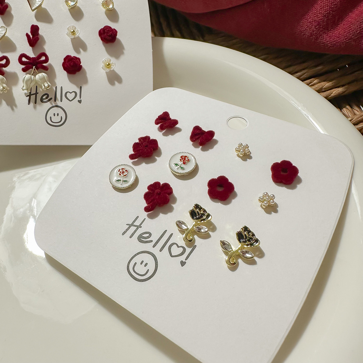The autumn and winter wine red bow velvet stud earring set features an exquisite, niche and elegant design. The earrings are versatile and suitable for women Application Scenario